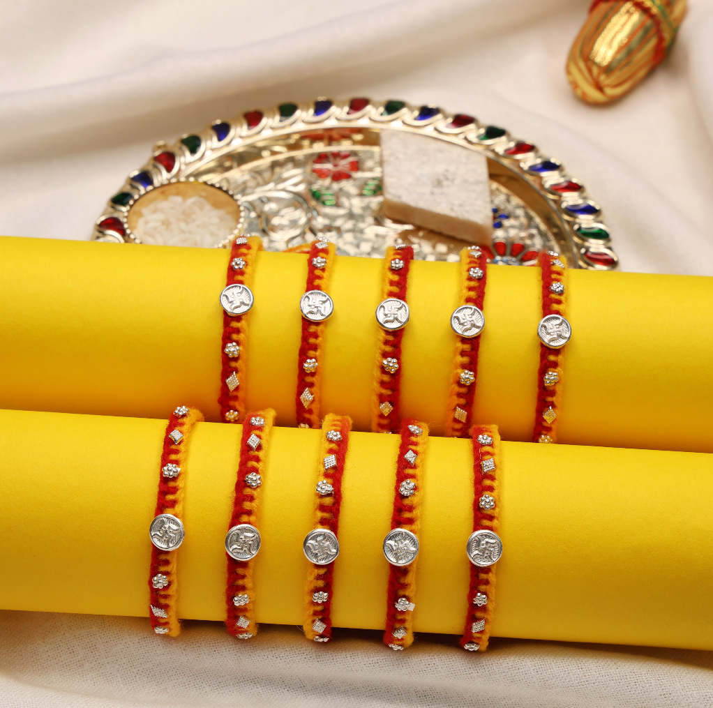 Swastik Charm Rakhi in Silver