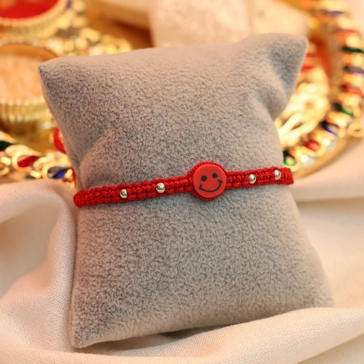 Joyful Red Smiley Rakhi in Silver