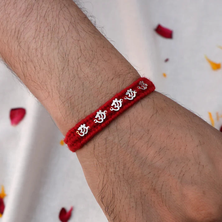Silver Rakhi with Om Charm