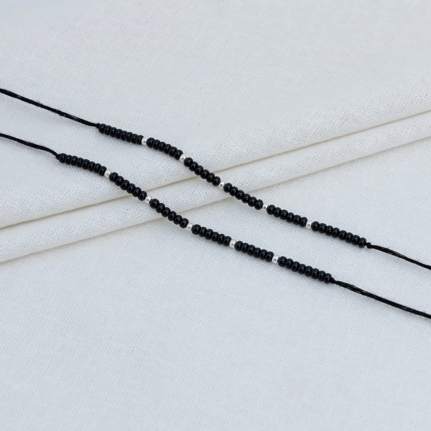 Black Beads Bracelet with Silver Accents