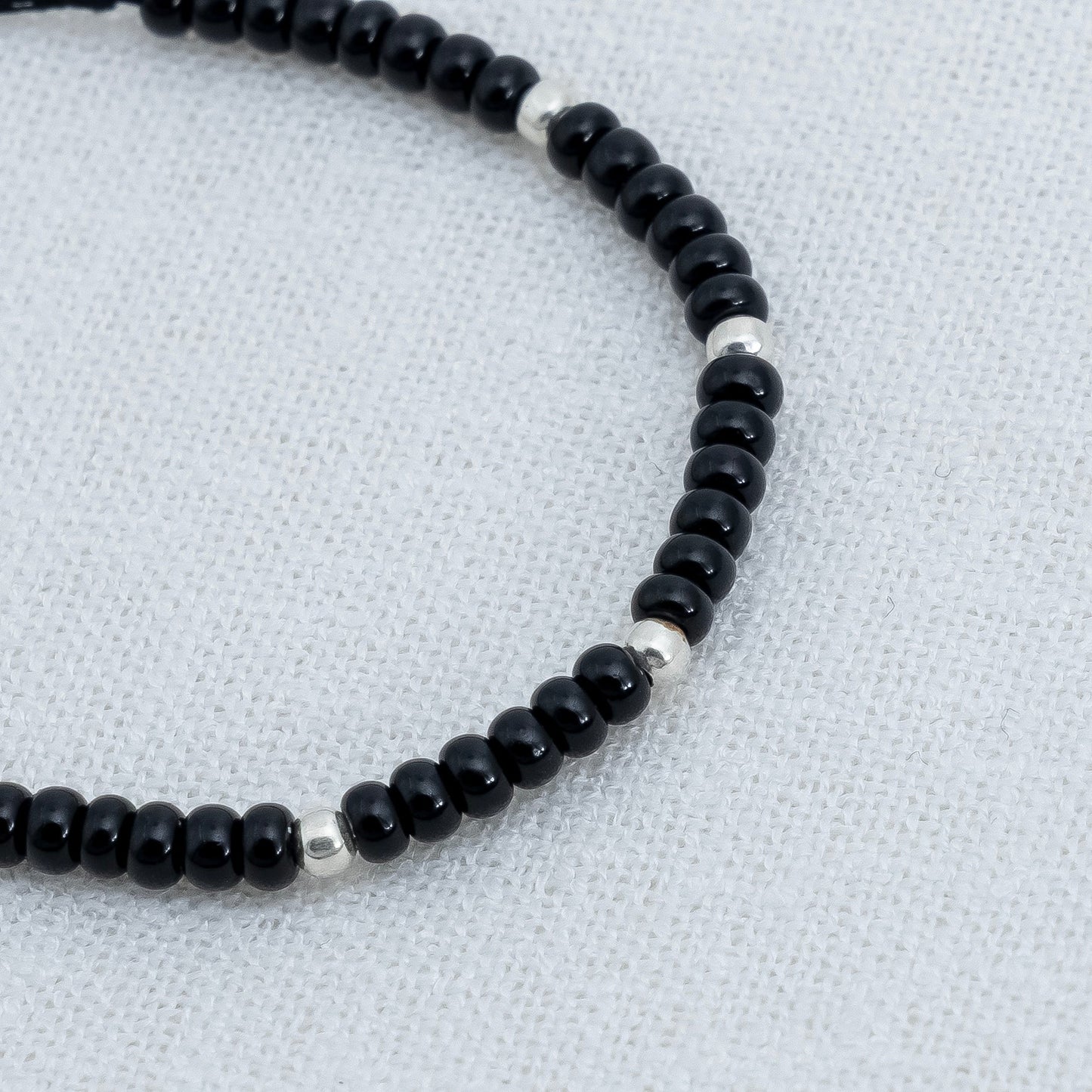 Black Beads Bracelet with Silver Accents
