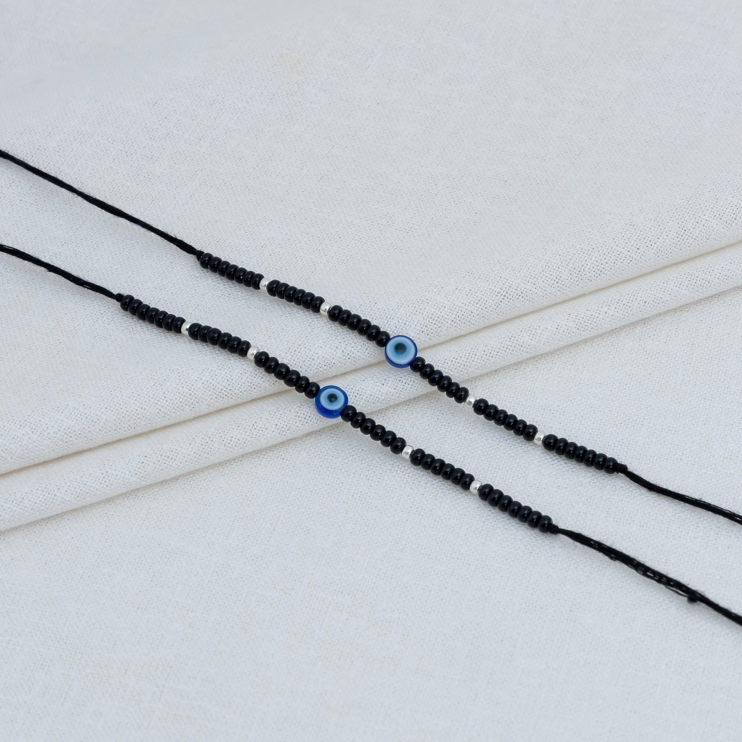 Black Beads Evil Eye Bracelet with Silver Accents