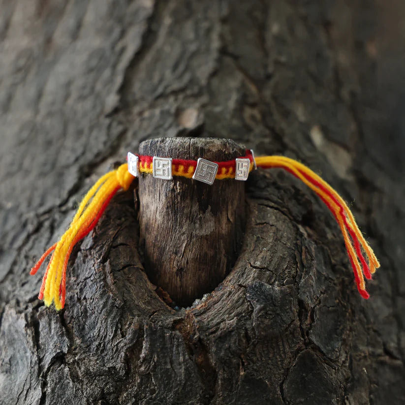Blessed Swastik Buds Rakhi
