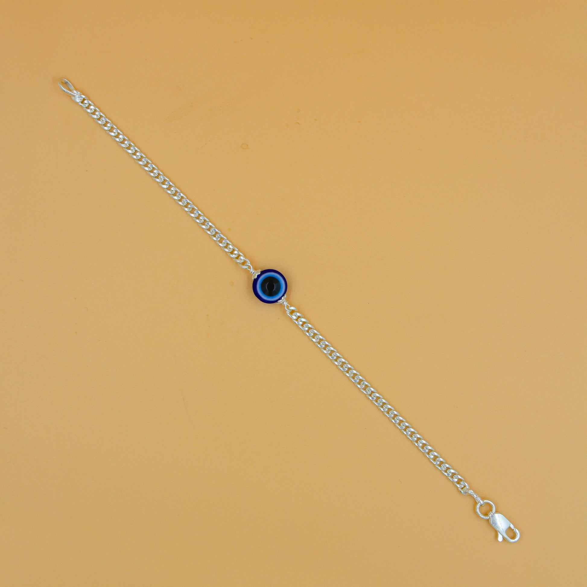 Trendy silver evil eye bracelet designed for both fashion and protection