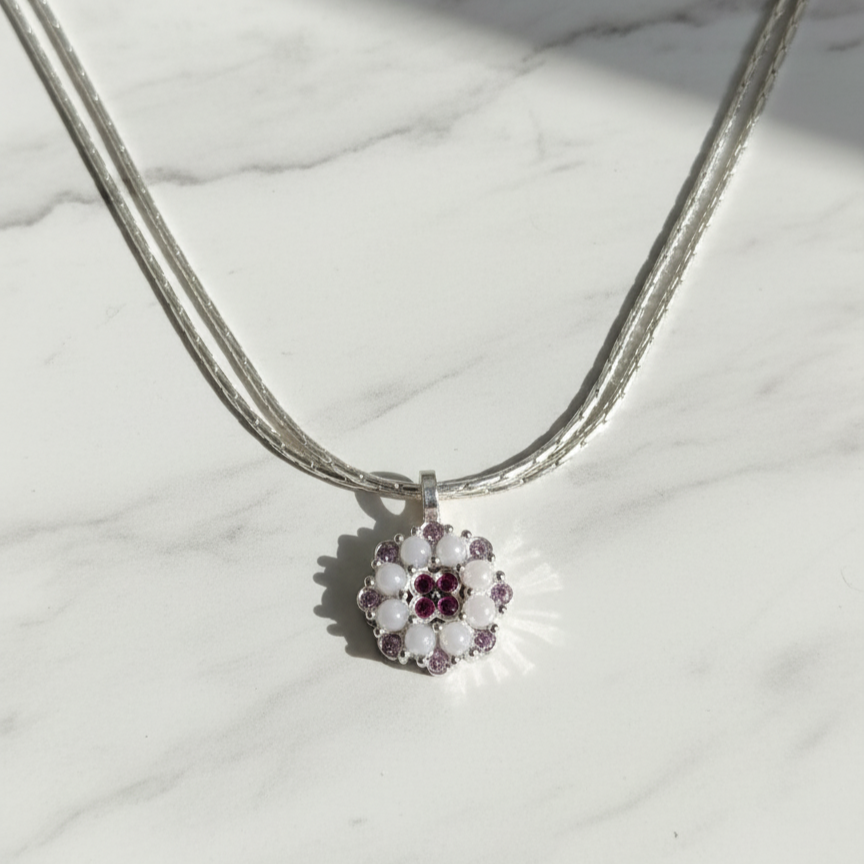 Minimal Silver Floral Pendant with Ruby Touch