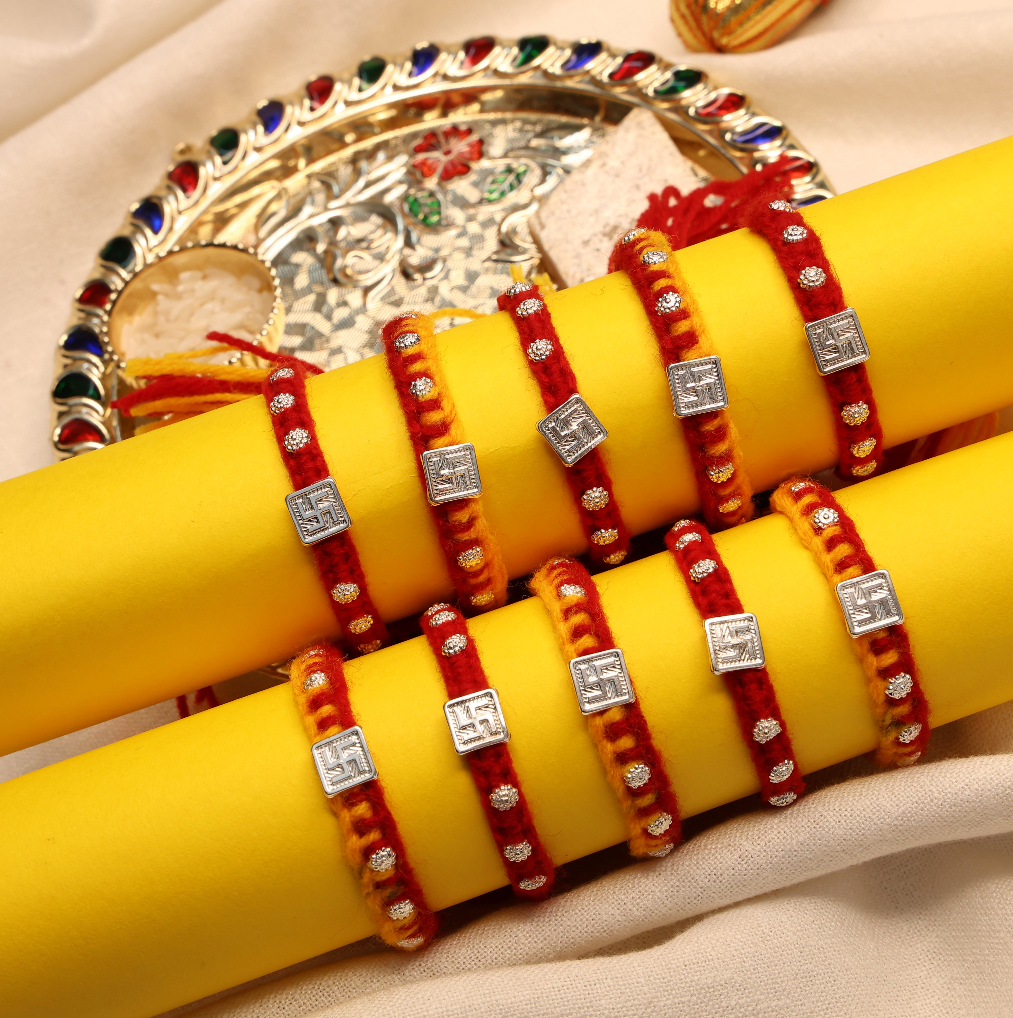 Swastik Glow Silver Rakhi Edition