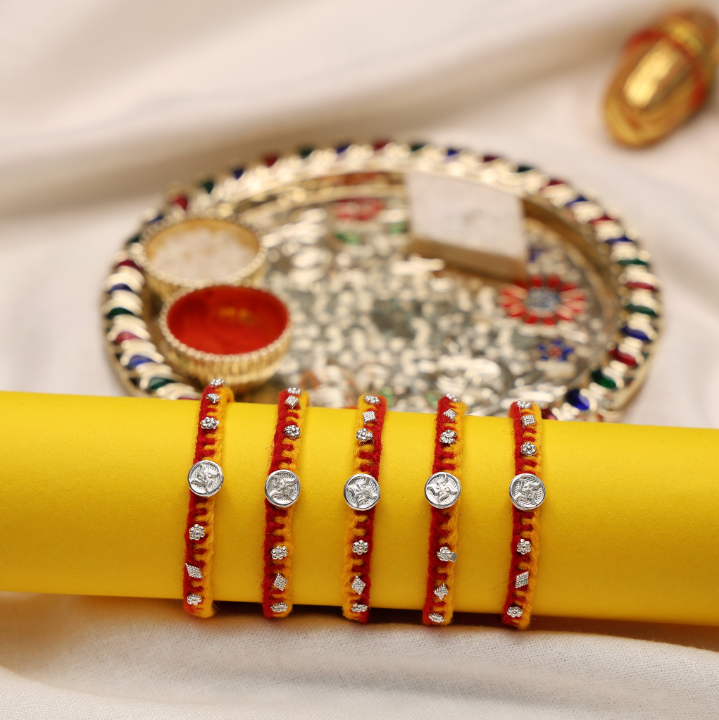 Swastik Charm Rakhi in Silver